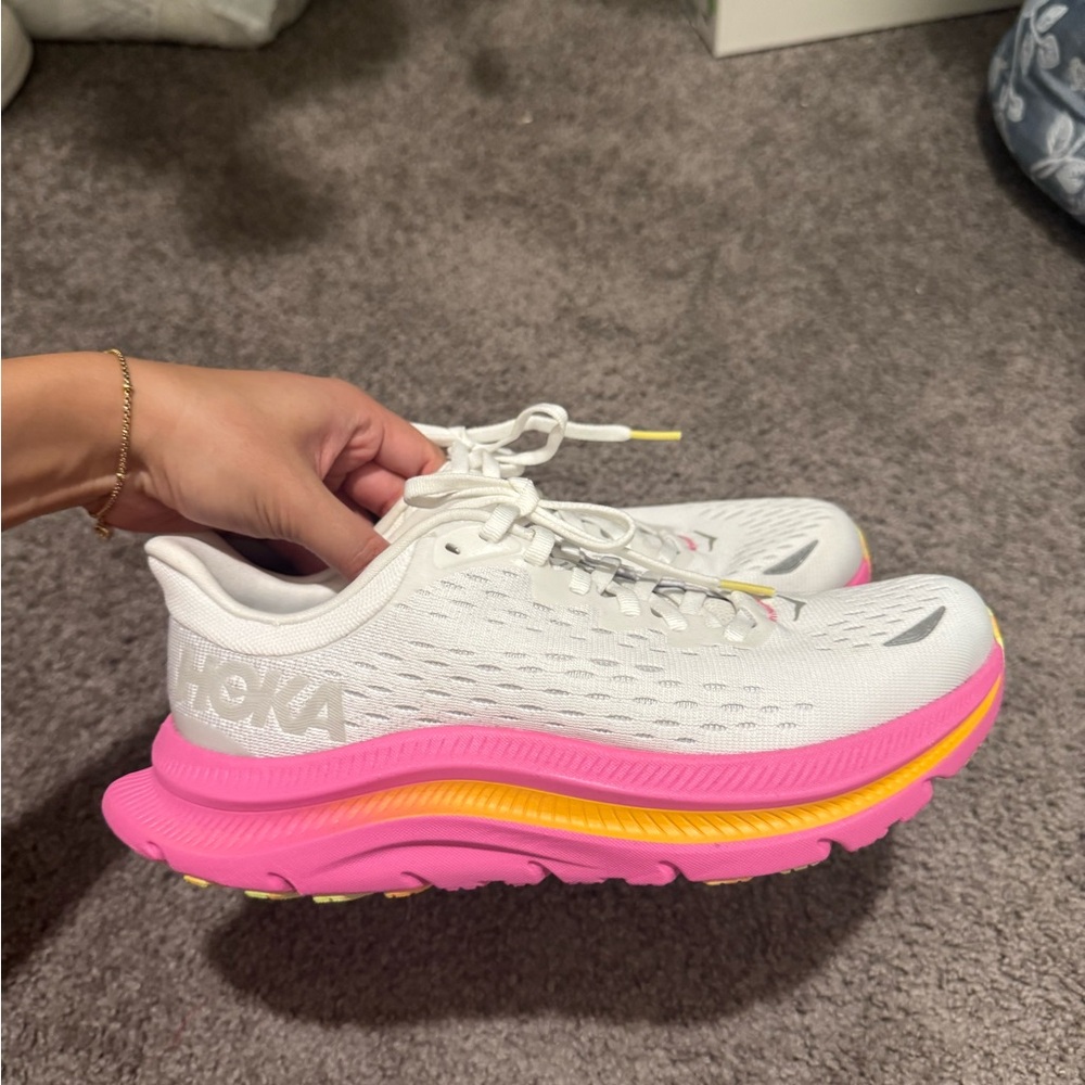Hoka White and Pink Athletic Shoes with Vibrant Sole
